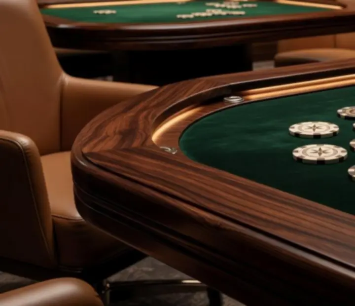 Premium poker tables in a timber-accented card lounge at Ember & Odds.