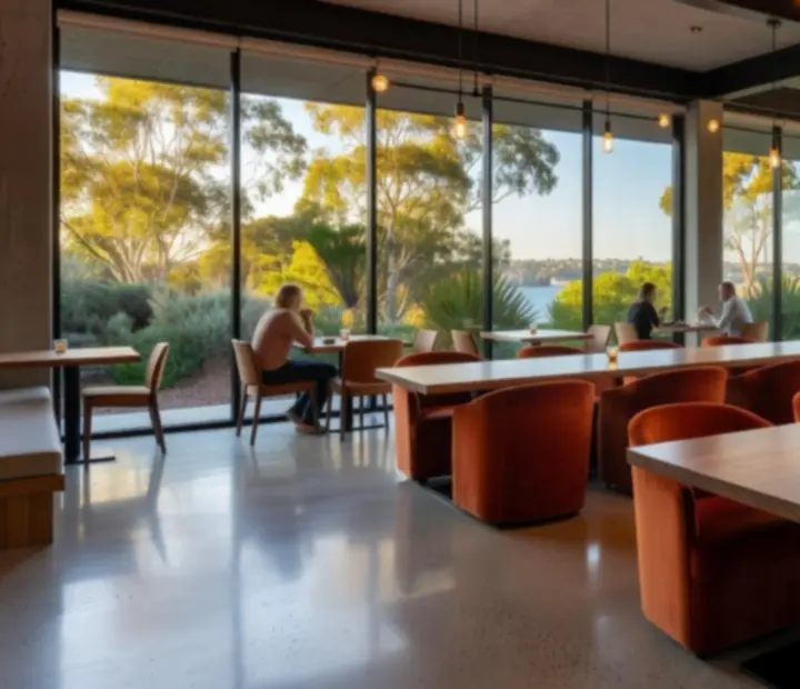 Light concrete and dark timber restaurant interior in Australia